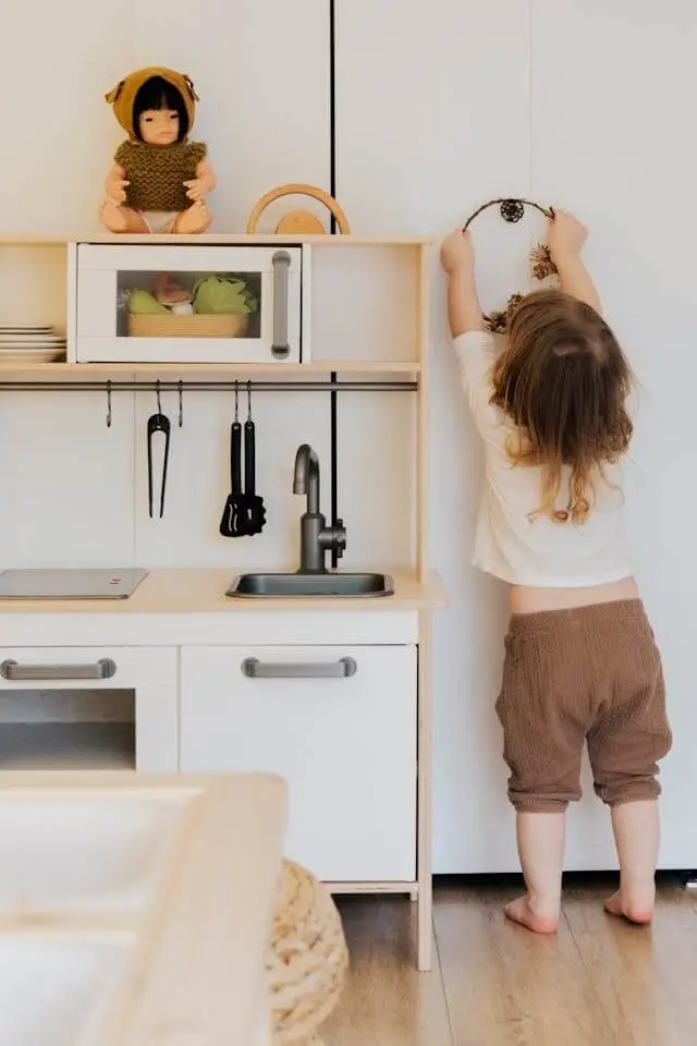 how to remove a child-proof lock on a kitchen cabinet